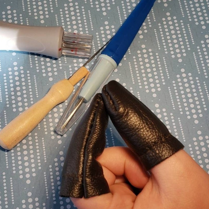 Leather finger covers. No more poked digits. Random colour. Price drops with multiples. Finger protection! Ships from Canada