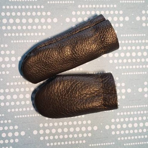Leather finger covers. No more poked digits. Random colour. Price drops with multiples. Finger protection! Ships from Canada