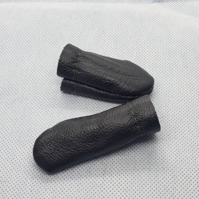 Leather finger covers. No more poked digits. Random colour. Price drops with multiples. Finger protection! Ships from Canada